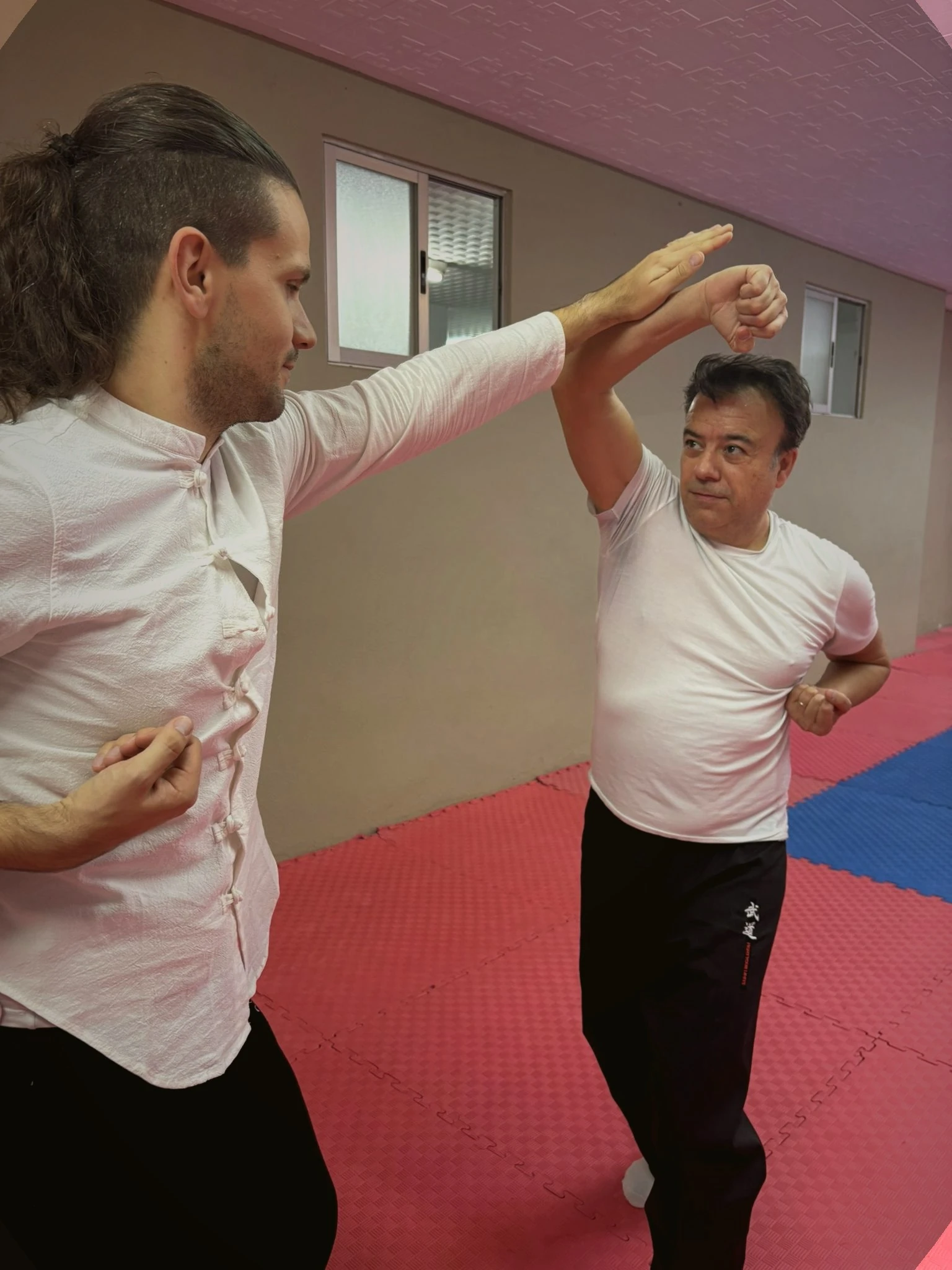 Ejercicio técnico por parejas en el tatami